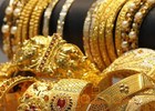 Gold price falls; silver rises by Rs 300