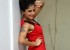 1425397624anukriti-govind-sharma-photo-shoot-red-color-sleeveless-top3