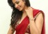 1424360236rakul-preet-singh-red-saree-pics1