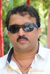 Veeru K