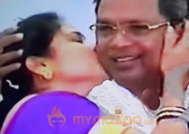 Woman kisses CM at Public Event