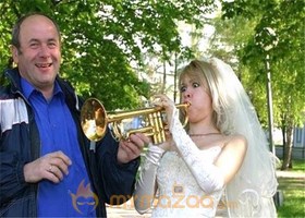 Playing trumpets Bride