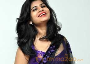 Alekhya Violet Color Half Saree Stills photo 17