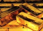 Gold hits record on global growth worries, Europe debt 