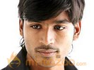 Dhanush peps up with 'Polladhavan'