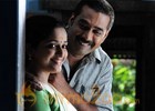 Kavya And Biju Menon In Onnum Midathae