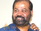 P. Vasu loses hair as barbers' protest