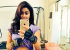 Shriya Saran Flaunts her toned Abs