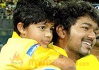 Vijay cheers with his son