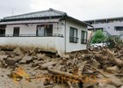 Japan broadcaster reports 8 killed, 13 missing in landslides in Hiroshima