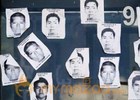 Mexico says bodies in mass graves aren't those of missing students