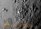 NASA releases first Pluto flyby images