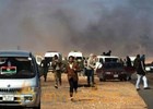 Intense fighting in Libya as Gaddafi holds on to power 