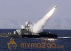 Iran tests missiles in navy war games near oil strait