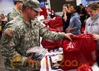 US military families line up for Christmas gifts 