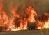 Fast-moving grass fire threatens homes in California, as crews continue to battle Yosemite blaze  