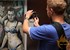 Russian police seize painting of Putin, Medvedev in women's underwear  