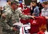 US military families line up for Christmas gifts